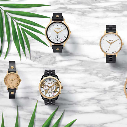 Promotional image for a Nixon watch collaboration featuring four Nixon watches