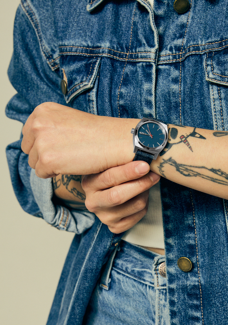 Woman wearing the Medium Time Teller Denim watch