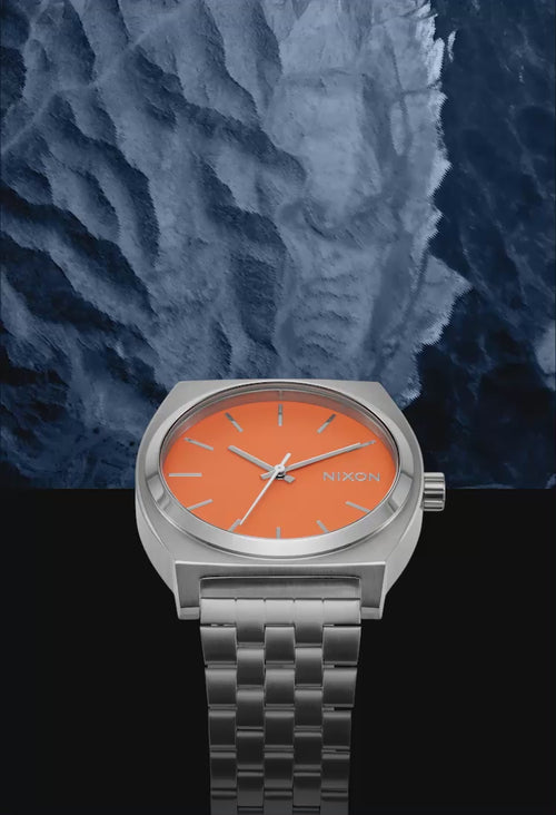 different watches rotating on blue textured background